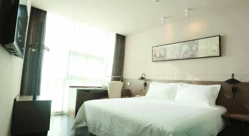 Bed in Jinjiang Inn Select Yancheng Oufeng Hua Street Julong Lake