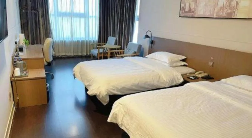 Bed in Jinjiang Inn Select Yancheng Oufeng Hua Street Julong Lake