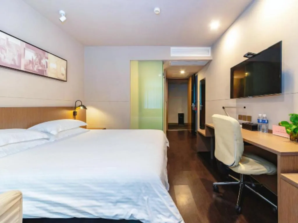 Bed in Jinjiang Inn Select Yancheng Oufeng Hua Street Julong Lake