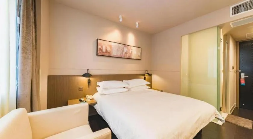 Bed in Jinjiang Inn Select Yancheng Oufeng Hua Street Julong Lake