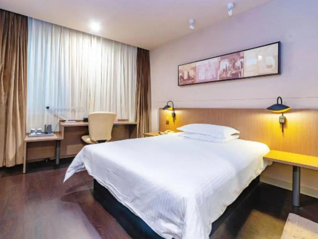 Bed in Jinjiang Inn Select Yancheng Oufeng Hua Street Julong Lake