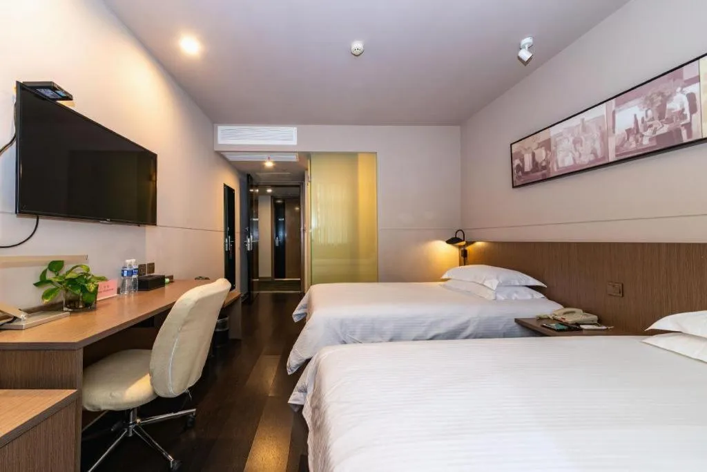 Bed in Jinjiang Inn Select Yancheng Oufeng Hua Street Julong Lake