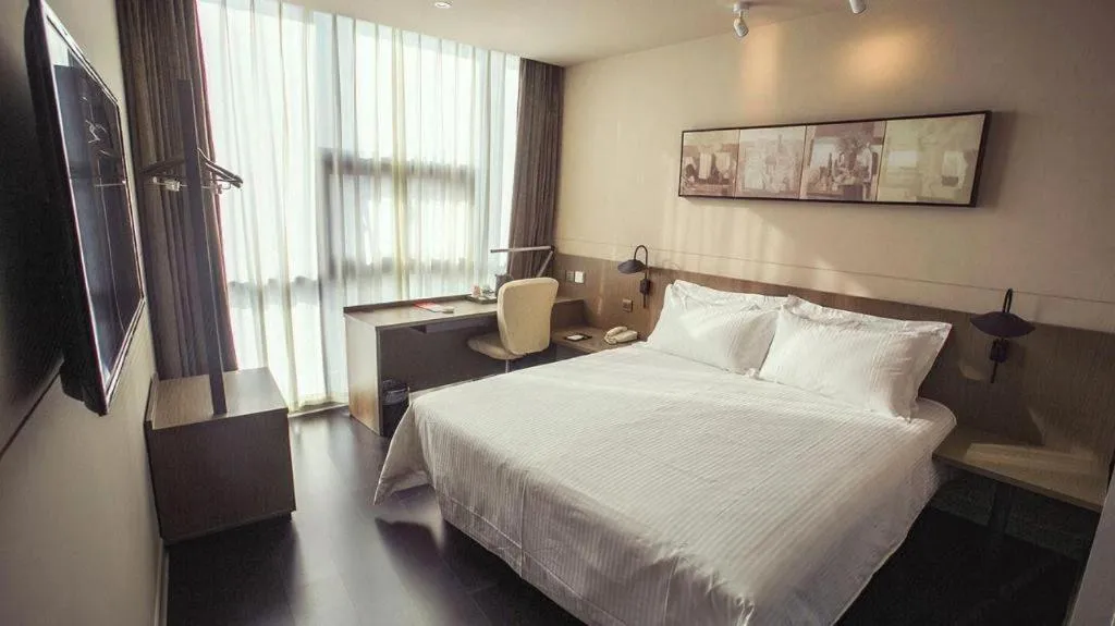 Bed in Jinjiang Inn Select Yancheng Oufeng Hua Street Julong Lake