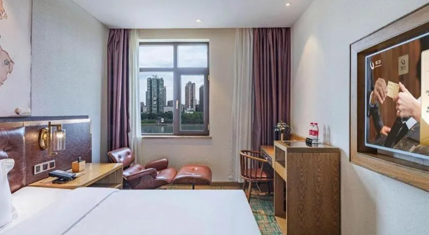 Bed in James Joyce Coffetel·Hengyang Jiefang Road Xianfeng Dock