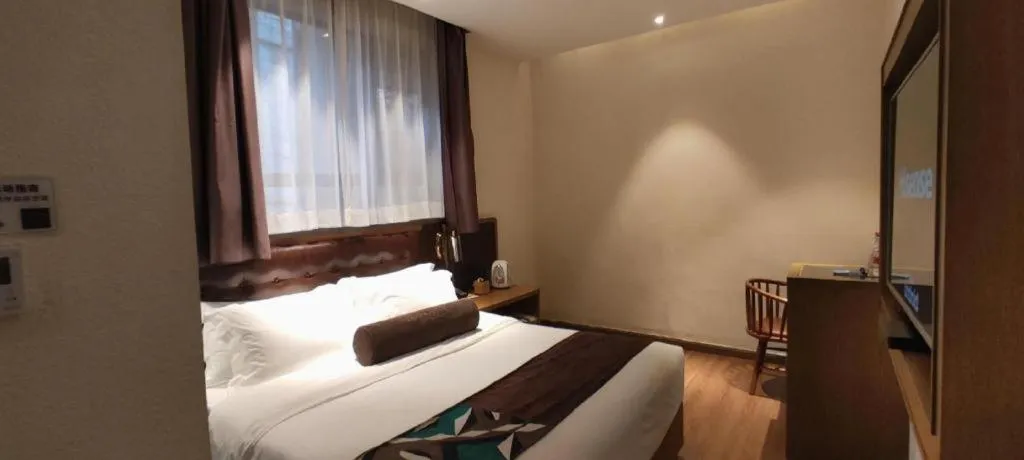 Bed in James Joyce Coffetel·Hengyang Jiefang Road Xianfeng Dock