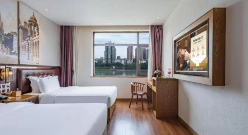 Bed in James Joyce Coffetel·Hengyang Jiefang Road Xianfeng Dock