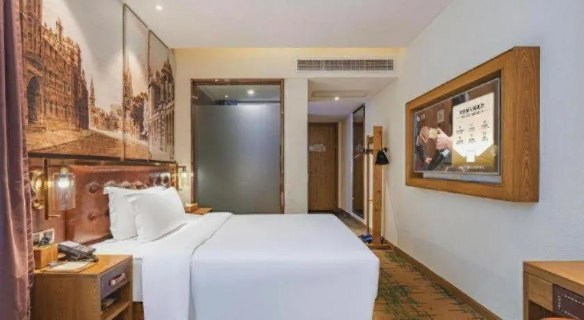 Bed in James Joyce Coffetel·Hengyang Jiefang Road Xianfeng Dock