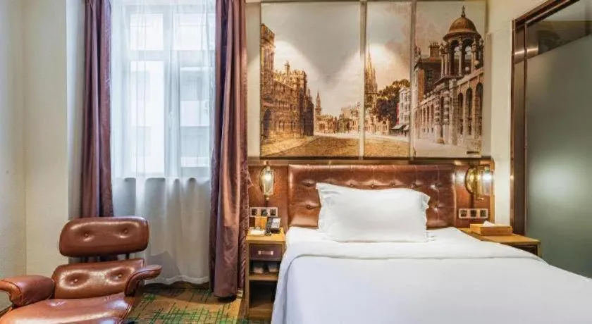 Bed in James Joyce Coffetel·Hengyang Jiefang Road Xianfeng Dock