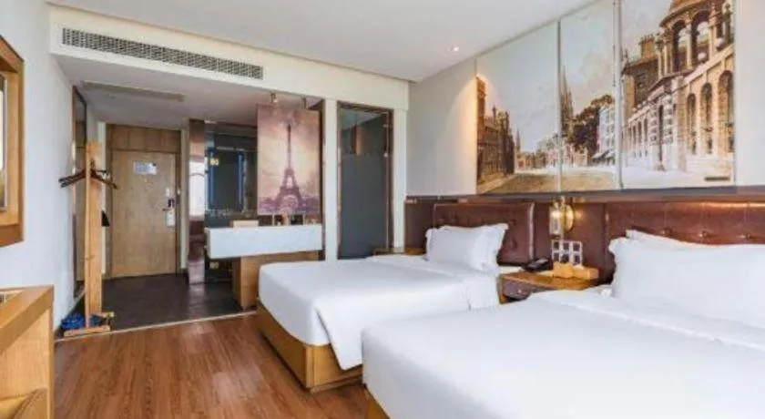 Bed in James Joyce Coffetel·Hengyang Jiefang Road Xianfeng Dock