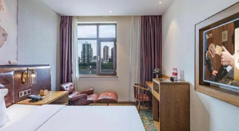 Bed in James Joyce Coffetel·Hengyang Jiefang Road Xianfeng Dock