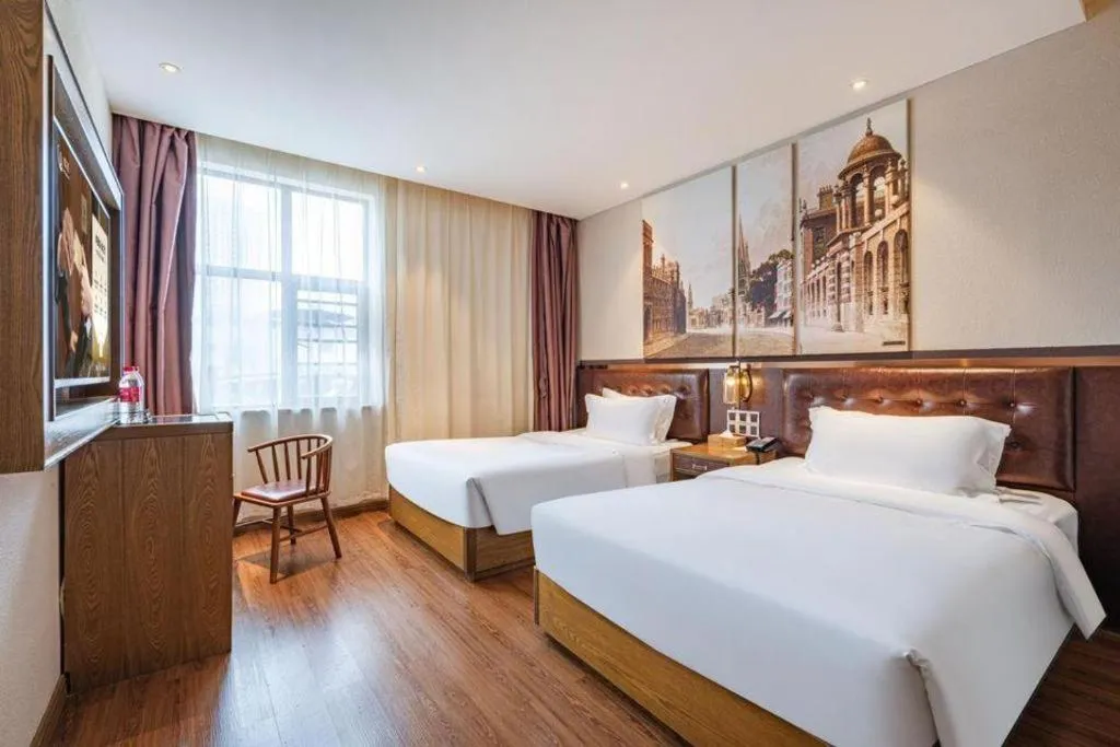 Bed in James Joyce Coffetel·Hengyang Jiefang Road Xianfeng Dock