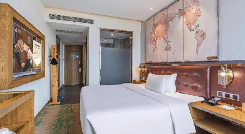 Bed in James Joyce Coffetel·Hengyang Jiefang Road Xianfeng Dock