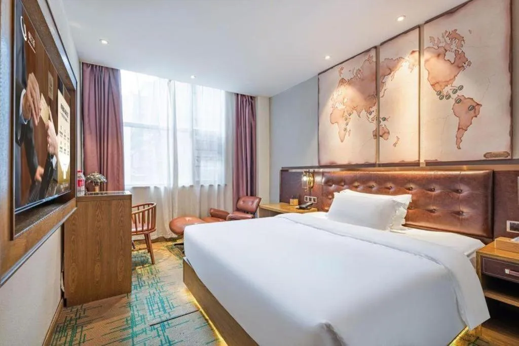 Bed in James Joyce Coffetel·Hengyang Jiefang Road Xianfeng Dock