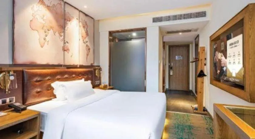 Bed in James Joyce Coffetel·Hengyang Jiefang Road Xianfeng Dock