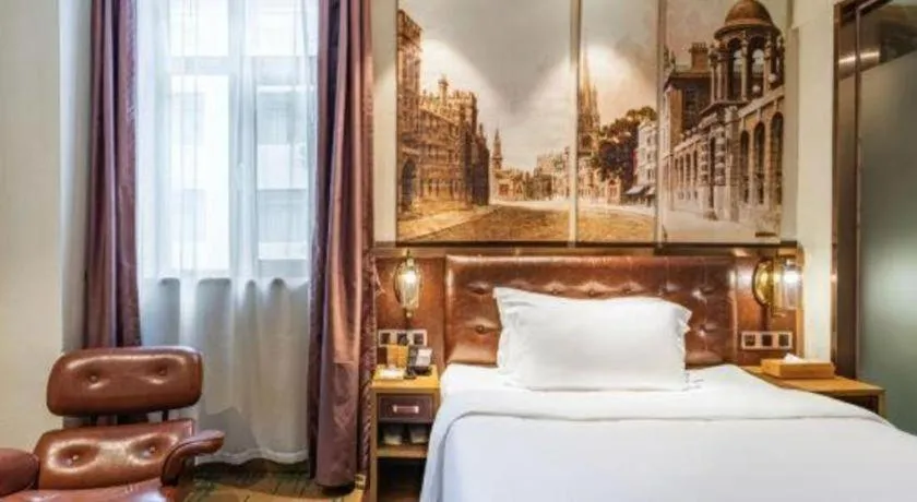 Bed in James Joyce Coffetel·Hengyang Jiefang Road Xianfeng Dock