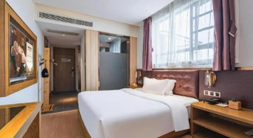 Bed in James Joyce Coffetel·Hengyang Jiefang Road Xianfeng Dock