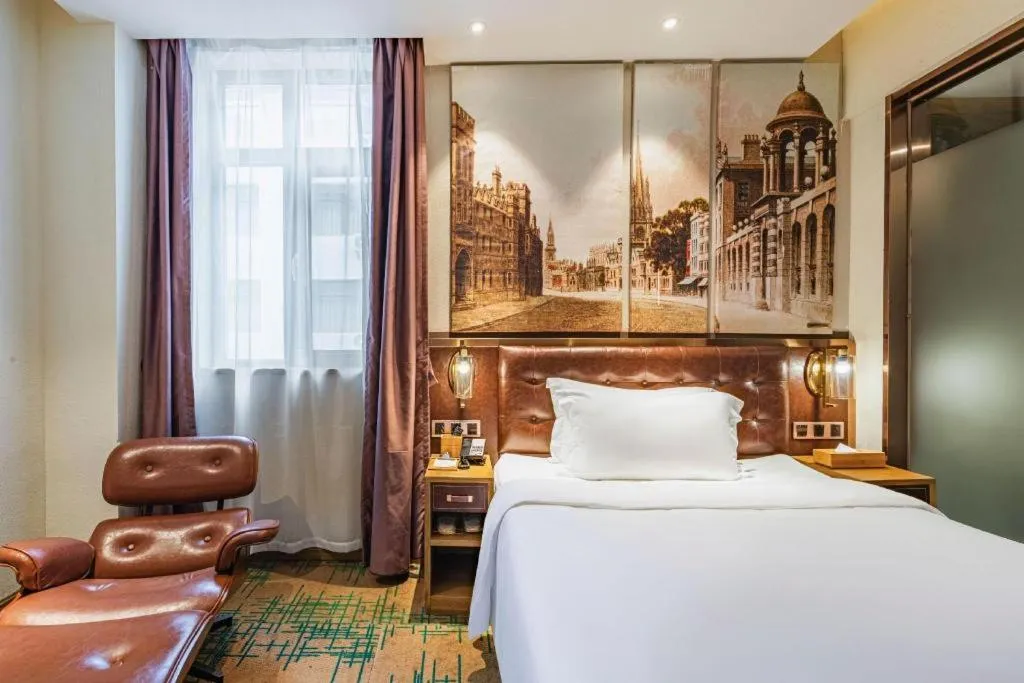 Bed in James Joyce Coffetel·Hengyang Jiefang Road Xianfeng Dock