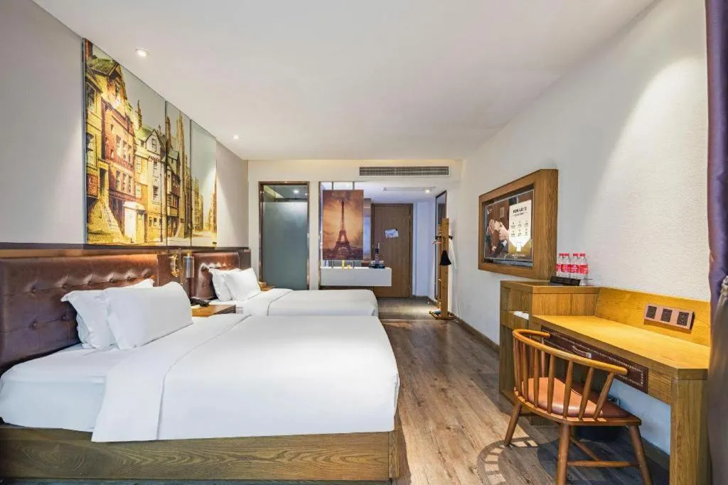 Bed in James Joyce Coffetel·Hengyang Jiefang Road Xianfeng Dock