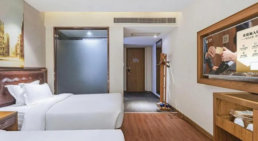 Bed in James Joyce Coffetel·Hengyang Jiefang Road Xianfeng Dock