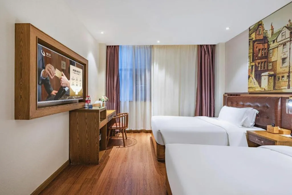 Bed in James Joyce Coffetel·Hengyang Jiefang Road Xianfeng Dock