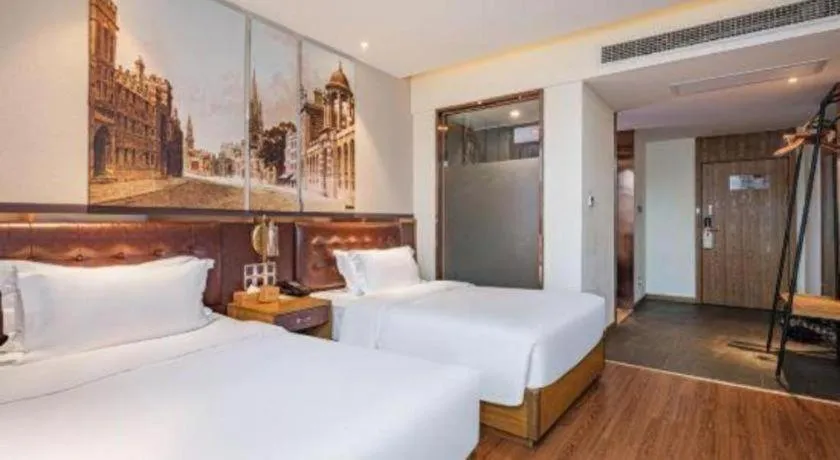 Bed in James Joyce Coffetel·Hengyang Jiefang Road Xianfeng Dock