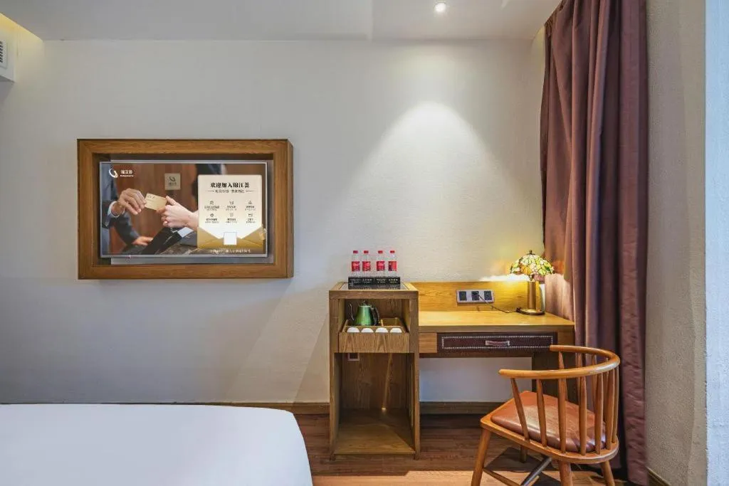 Bed in James Joyce Coffetel·Hengyang Jiefang Road Xianfeng Dock