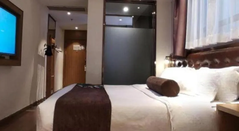 Bed in James Joyce Coffetel·Hengyang Jiefang Road Xianfeng Dock
