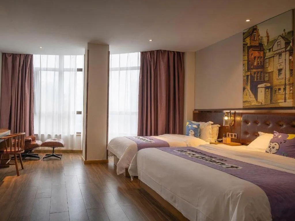 Bed in James Joyce Coffetel·Hengyang Jiefang Road Xianfeng Dock