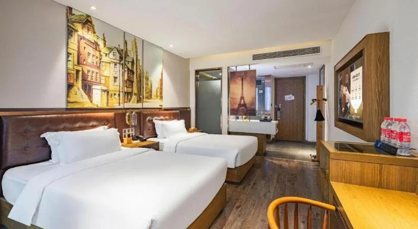 Bed in James Joyce Coffetel·Hengyang Jiefang Road Xianfeng Dock