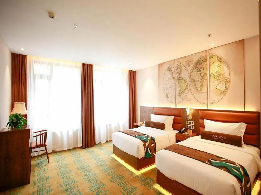 Bed in James Joyce Coffetel Harbin Railway Station Songlei Yuanda Pedestrian Street