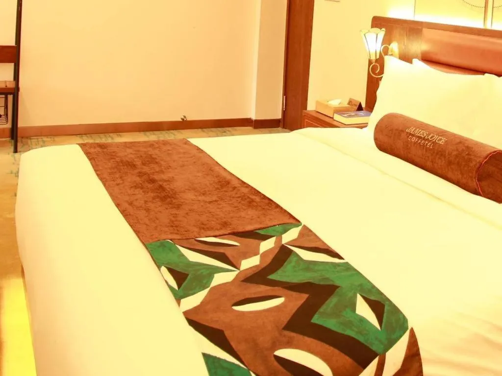 Bed in James Joyce Coffetel Harbin Railway Station Songlei Yuanda Pedestrian Street