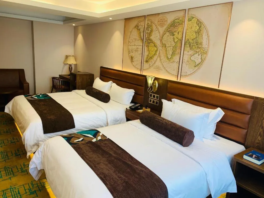 Bed in James Joyce Coffetel Harbin Railway Station Songlei Yuanda Pedestrian Street