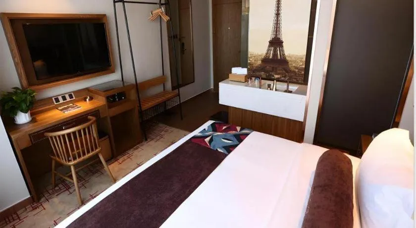 Bed in James Joyce Coffetel·Huludao Xingcheng Seaside Tourist Scenic Spot