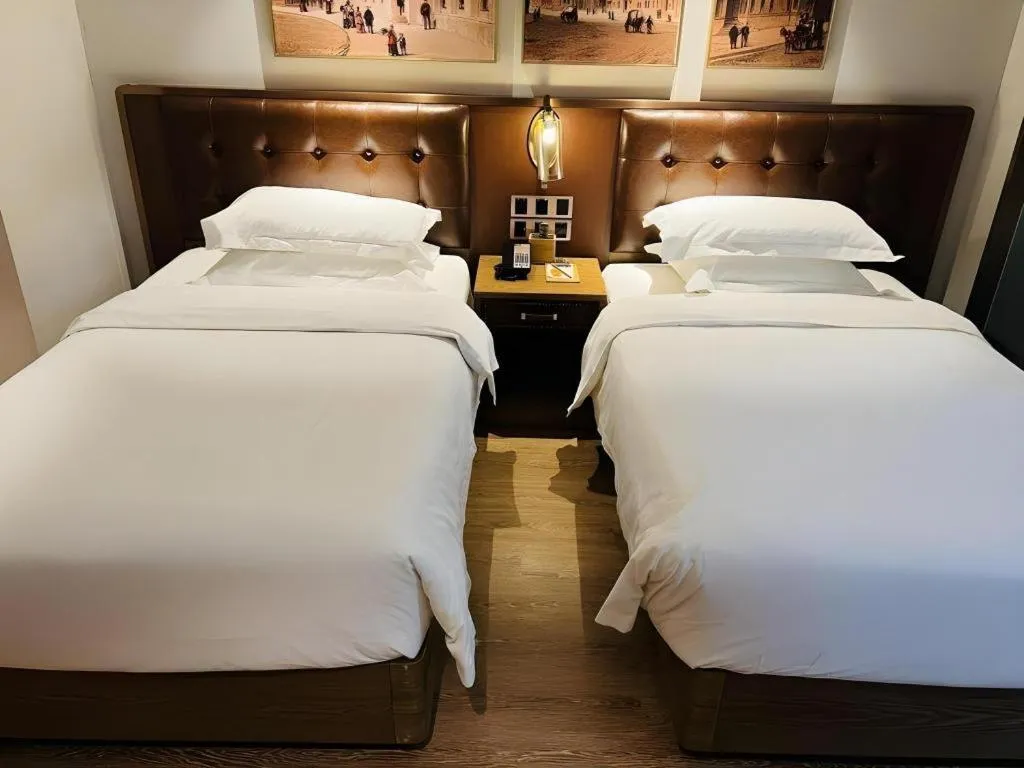 Bed in James Joyce Coffetel·Huludao Xingcheng Seaside Tourist Scenic Spot