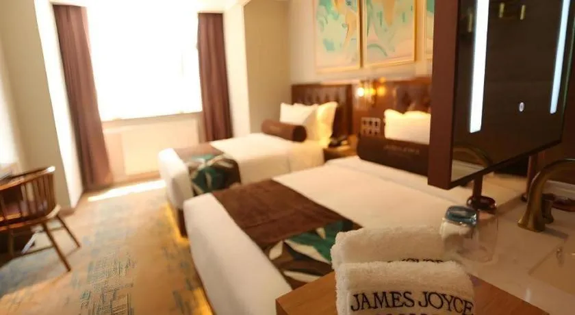 Bed in James Joyce Coffetel·Huludao Xingcheng Seaside Tourist Scenic Spot