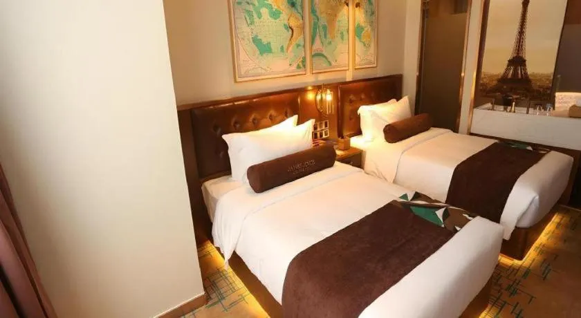 Bed in James Joyce Coffetel·Huludao Xingcheng Seaside Tourist Scenic Spot