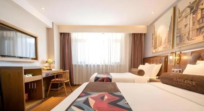 Bed in James Joyce Coffetel·Huludao Xingcheng Seaside Tourist Scenic Spot