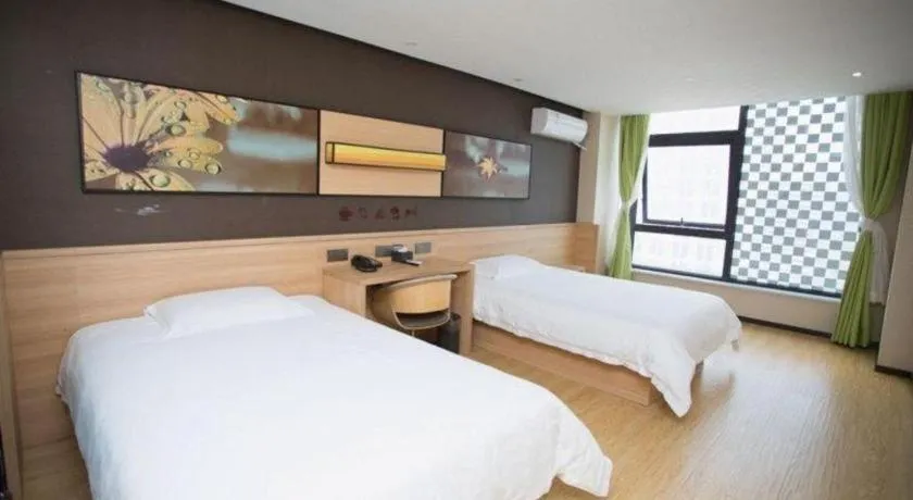 Bed in IU Hotel Nanchang West Railway Metro Station