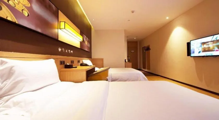 Bed in IU Hotel Nanchang West Railway Metro Station