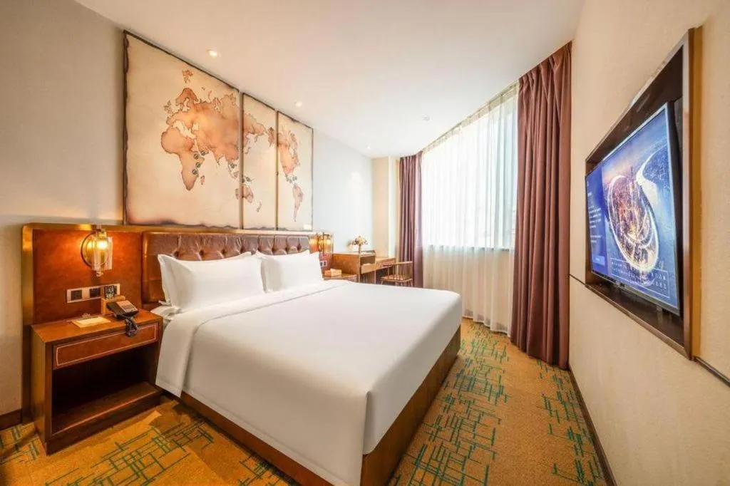 Bed in James Joyce Coffetel Chengdou Wuqing Wanda Plaza