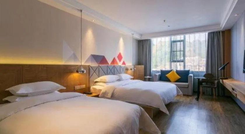 Bed in Borrman Hotel Hechi Bama Central Cultural Plaza