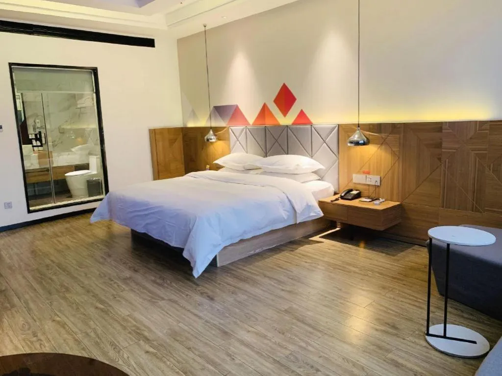 Bed in Borrman Hotel Hechi Bama Central Cultural Plaza