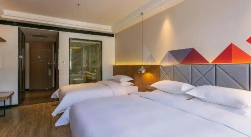 Bed in Borrman Hotel Hechi Bama Central Cultural Plaza