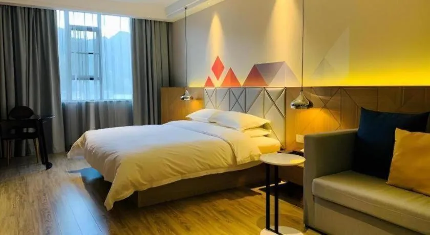 Bed in Borrman Hotel Hechi Bama Central Cultural Plaza