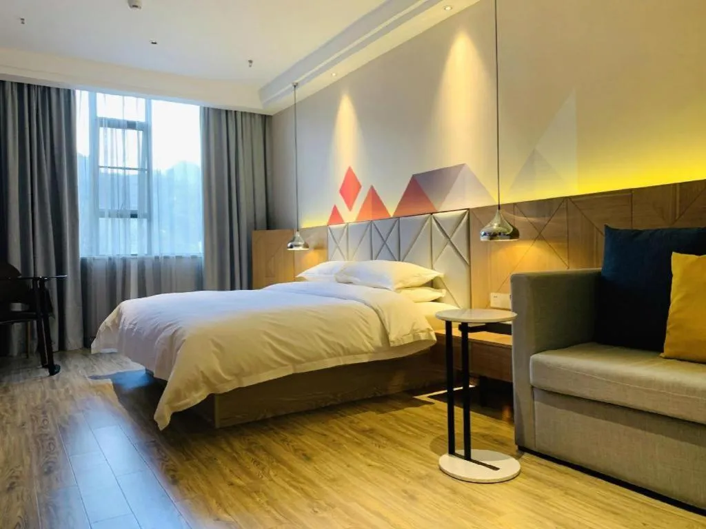 Bed in Borrman Hotel Hechi Bama Central Cultural Plaza