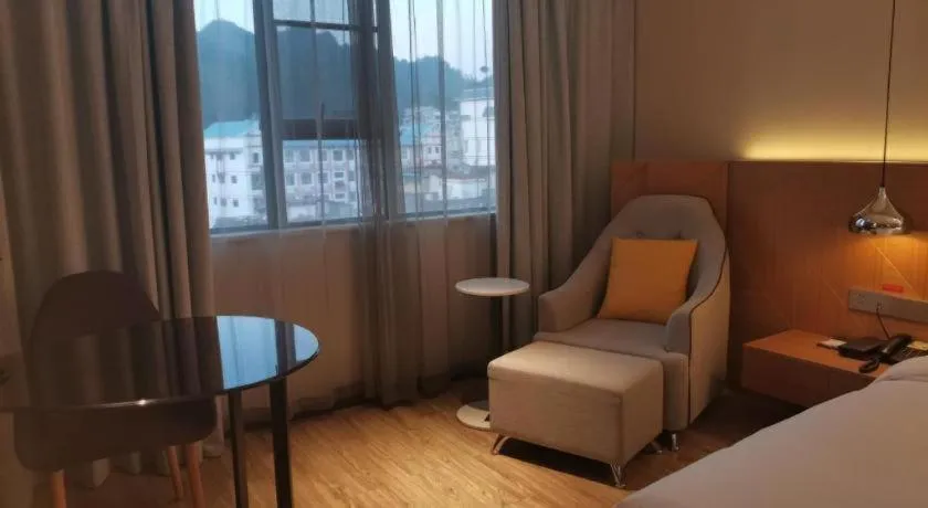 Bed in Borrman Hotel Hechi Bama Central Cultural Plaza