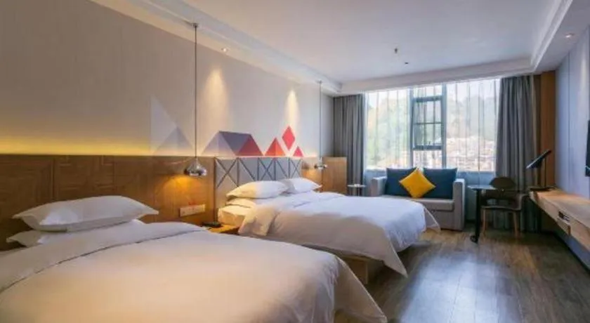 Bed in Borrman Hotel Hechi Bama Central Cultural Plaza