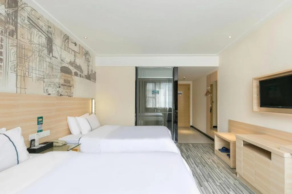 Bed in City Comfort Inn Guangzhou Zengcheng Wanda Plaza Metro Station