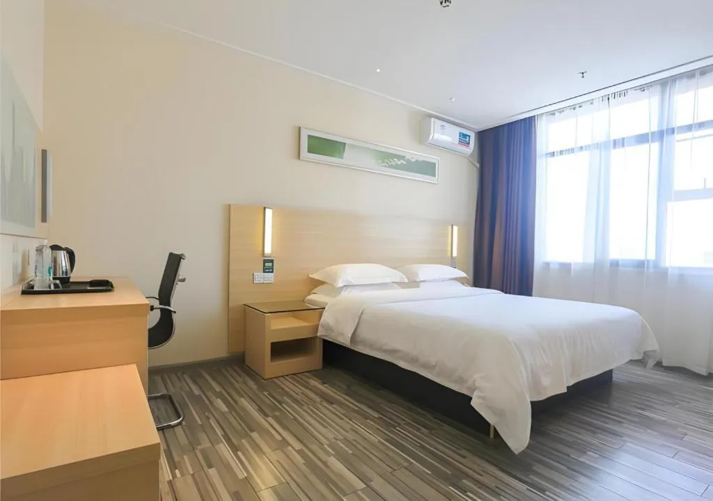 Bed in City Comfort Inn Guangzhou Zengcheng Wanda Plaza Metro Station