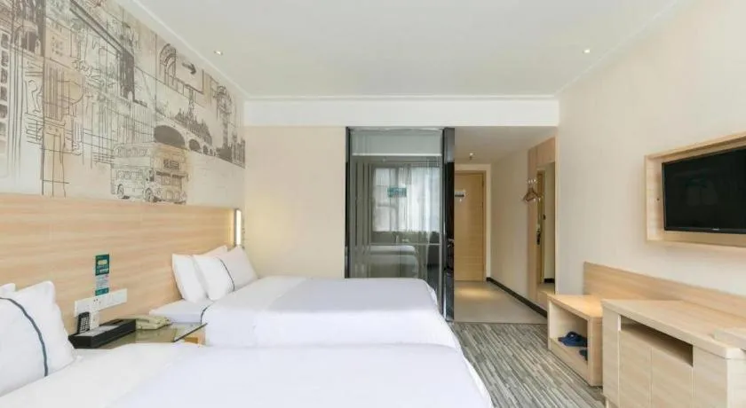 Bed in City Comfort Inn Guangzhou Zengcheng Wanda Plaza Metro Station